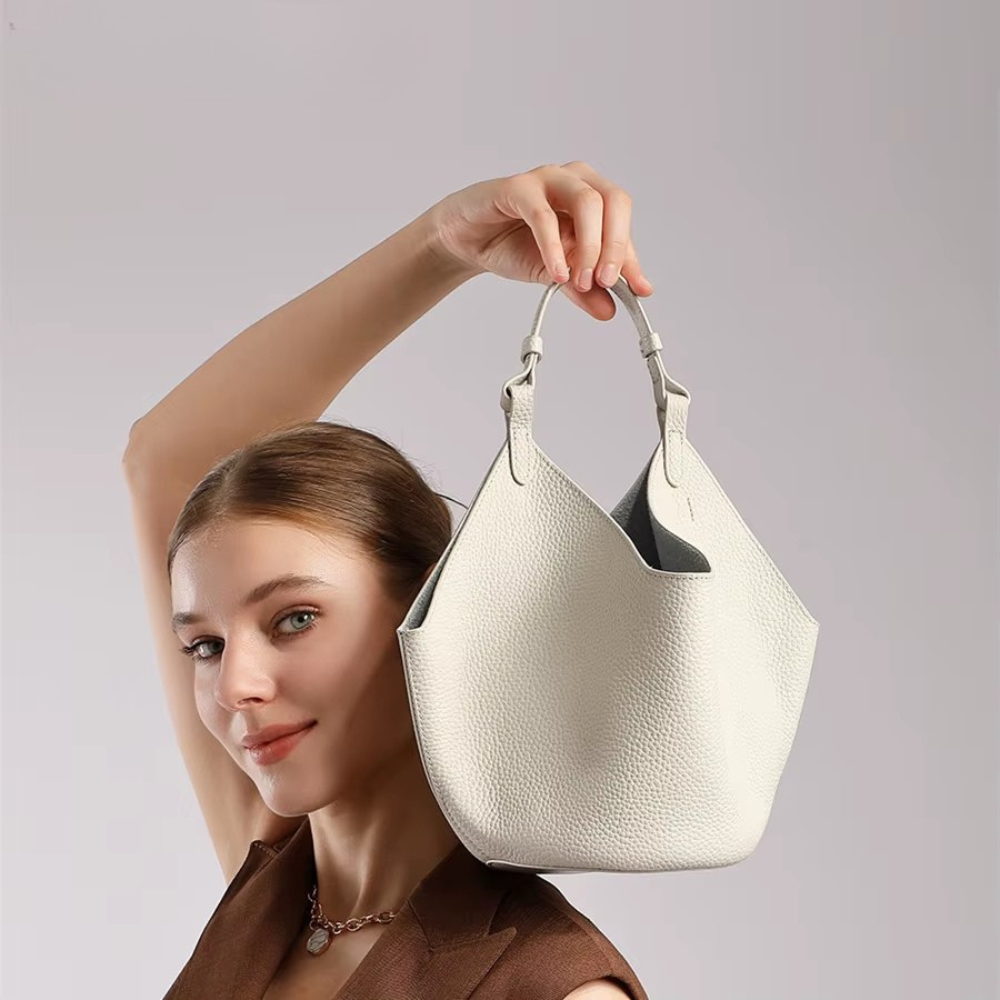 YANATARI Axelremsväska